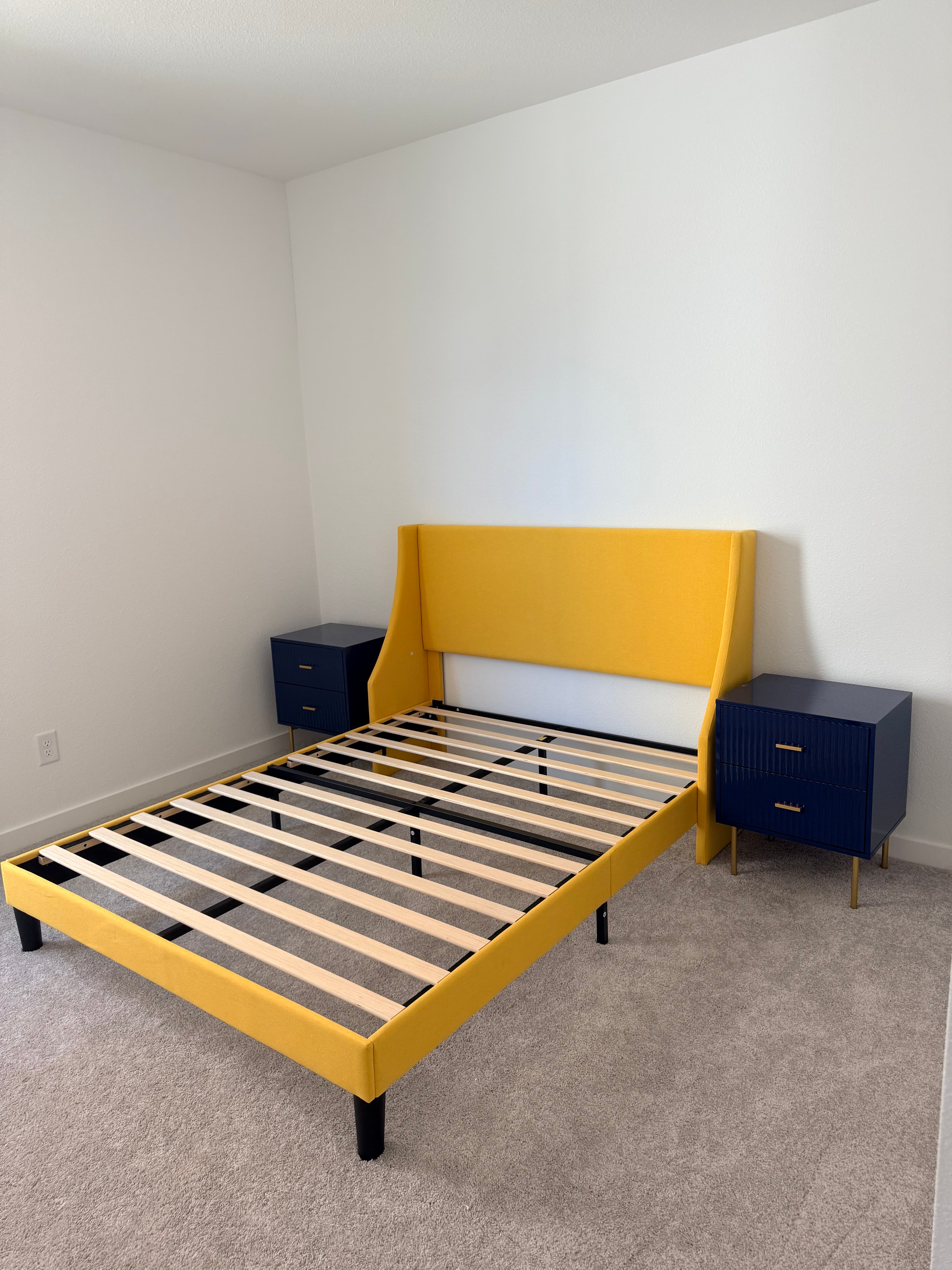 Yellow and navy blue children's bed frame