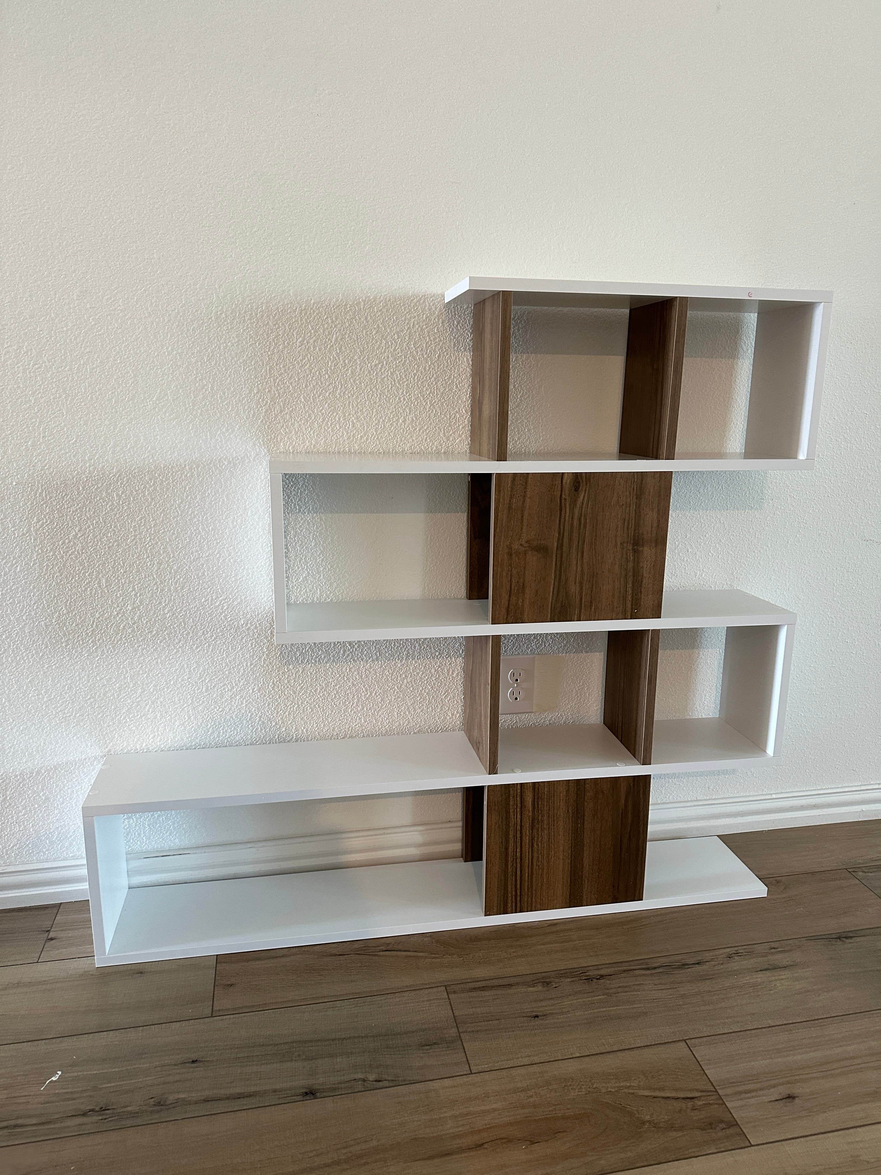 White and wood wall-mounted shelving unit