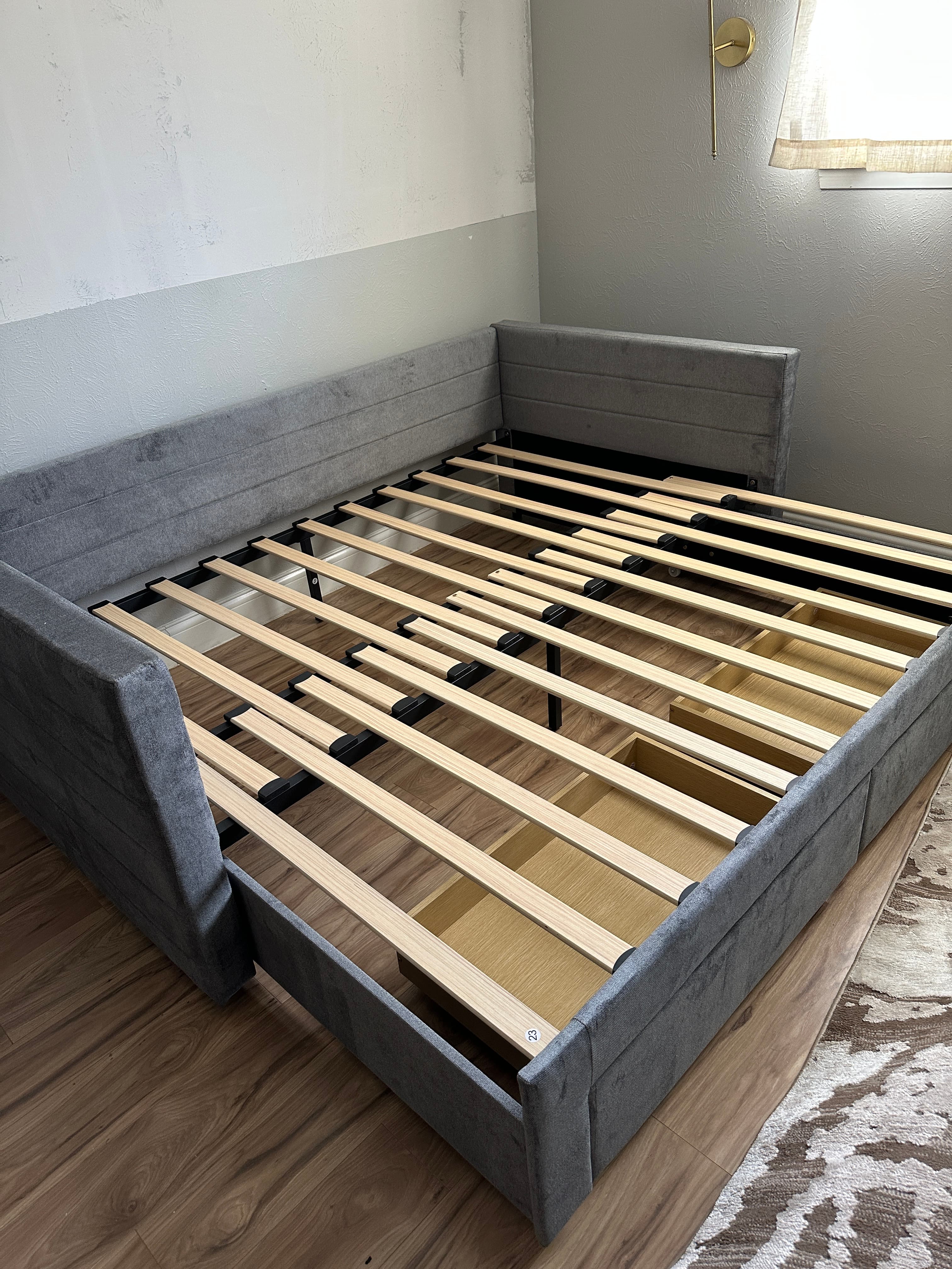 Gray upholstered platform bed frame