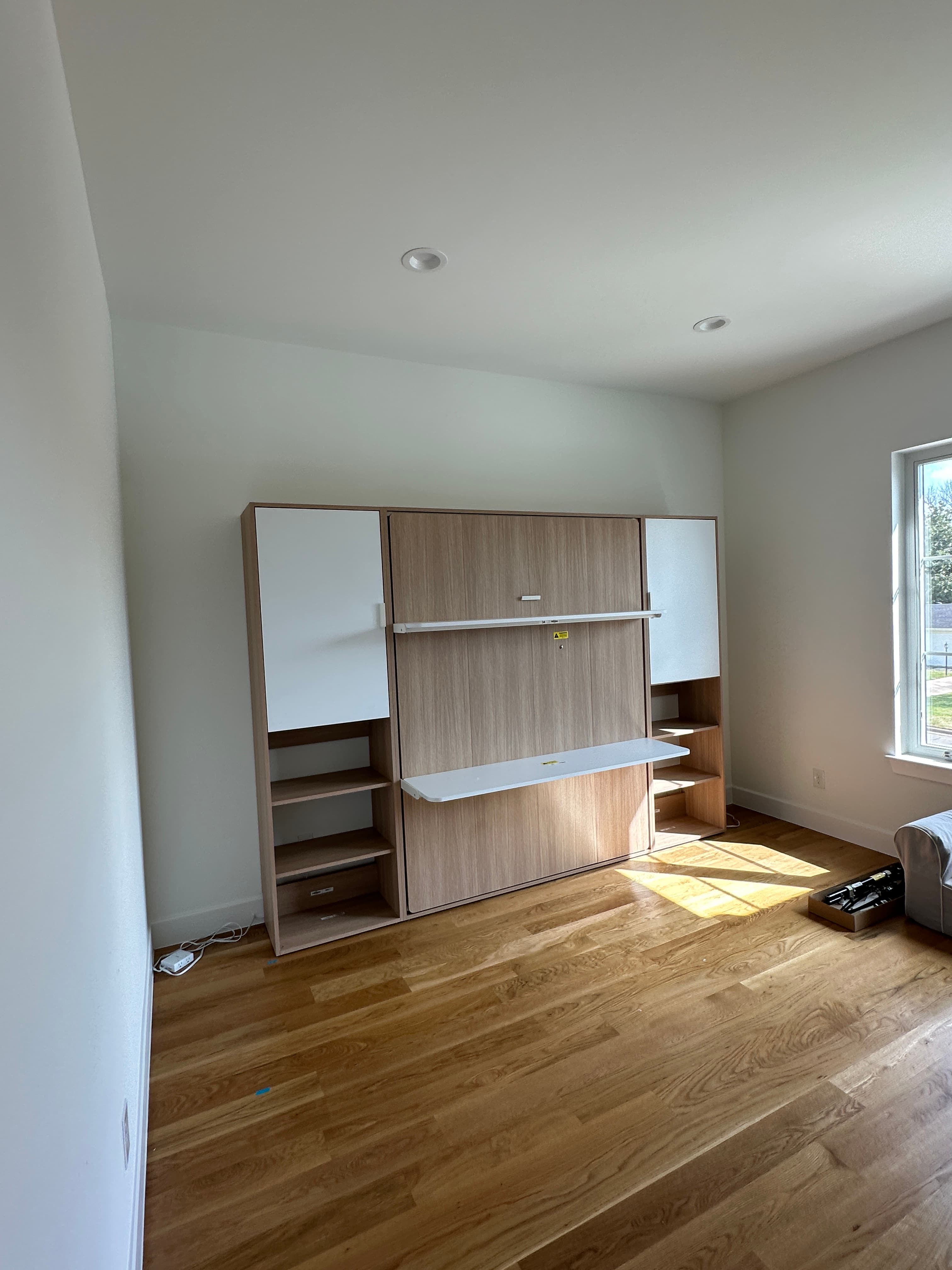 Bed frame with integrated storage compartments