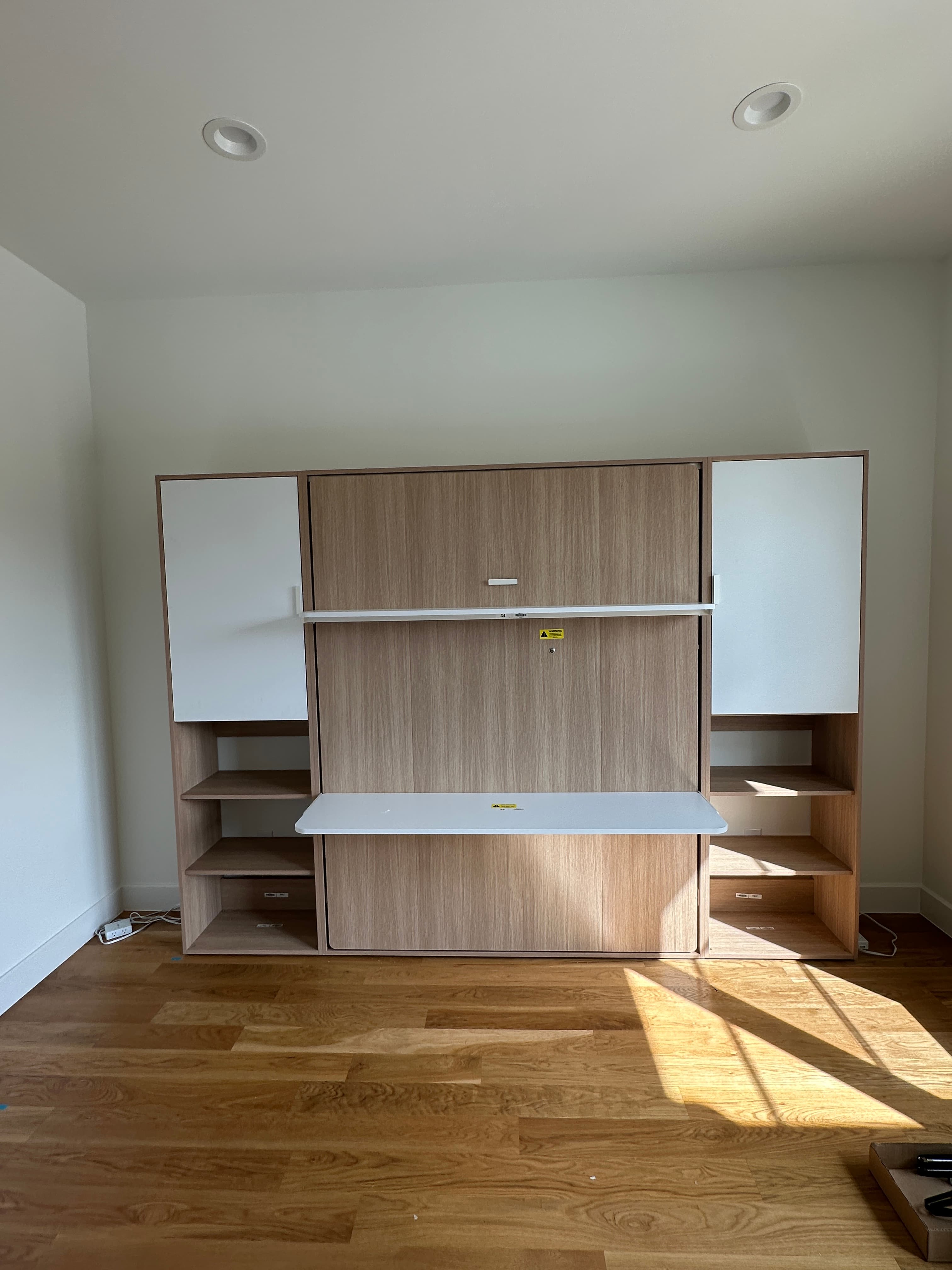 White modular shelving system with compartments